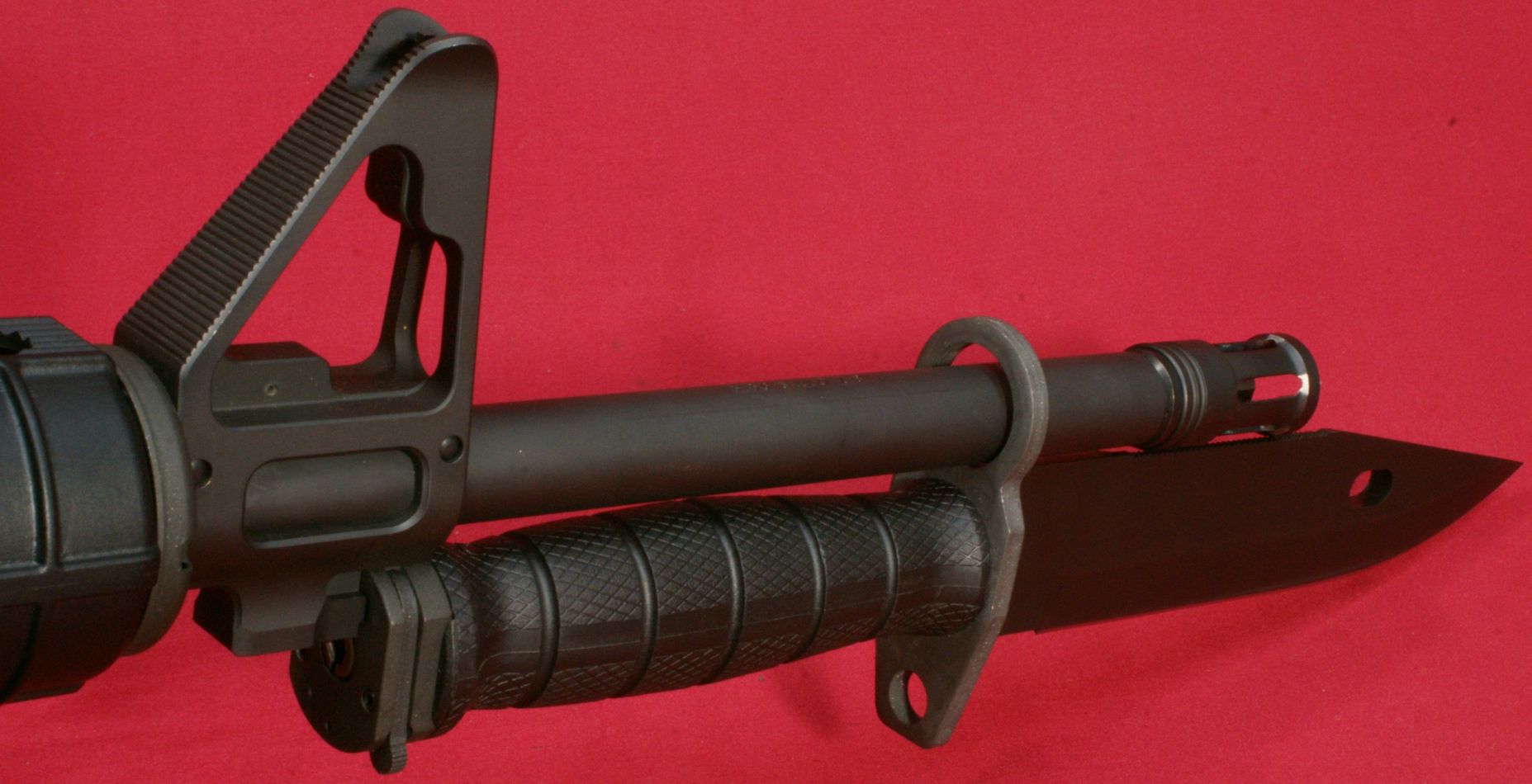 Figure 1 - Ruger AR-556 with Ontario M9 Bayonet.